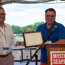 Trinity HIll's George Kingston accepts scholarship award on behalf of Reverend Guillermo Garcia